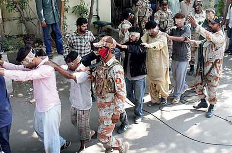 Anti terrorism court acquits MQM workers arrested during Nine Zero raid