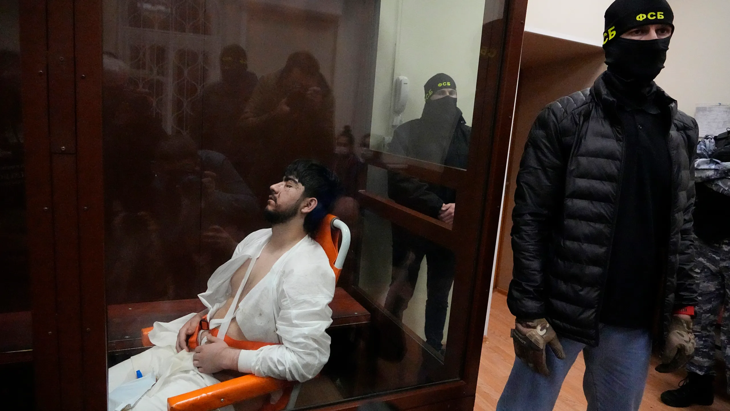 Badly tortured Moscow attack suspects charged