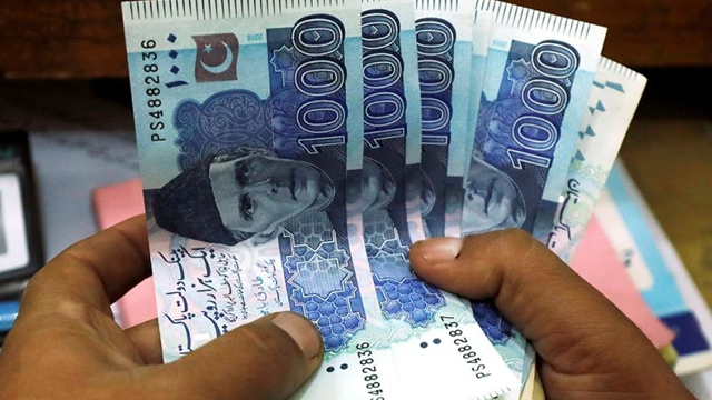 Pakistani rupee edges lower against US dollar