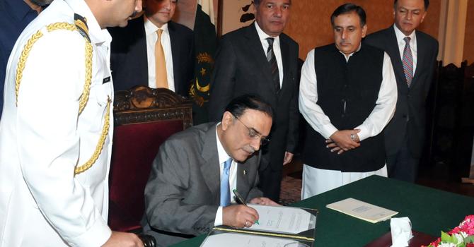 President Zardari inks madrassa registration bill into law
