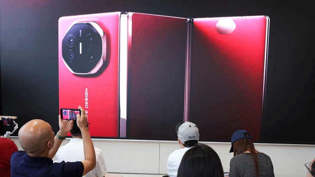 Huawei steals spotlight from Apple with launch of tri-fold smartphone