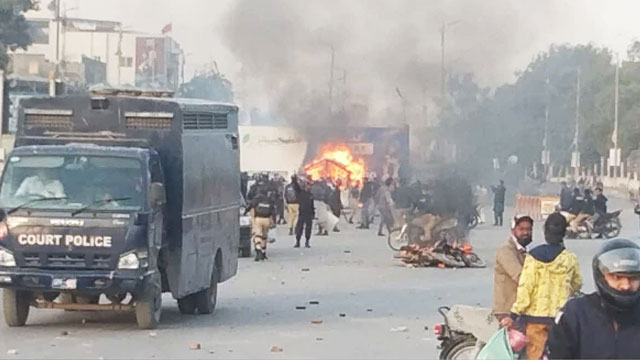 Police fire tear gas and charge protesters at Numaish Chowrangi