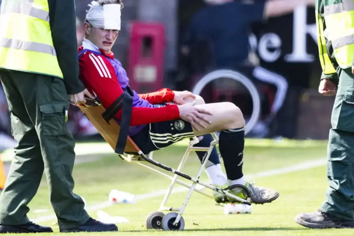 Aberdeen’s Jack MacKenzie Injured by Object Thrown During Pitch Invasion at Dundee United