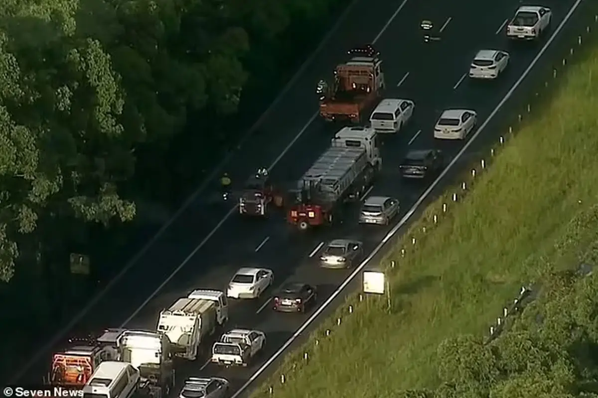 Truck Driver Charged After 840kg of Metal Shards Spill on NSW’s M1 Motorway, Damaging 300 Vehicles