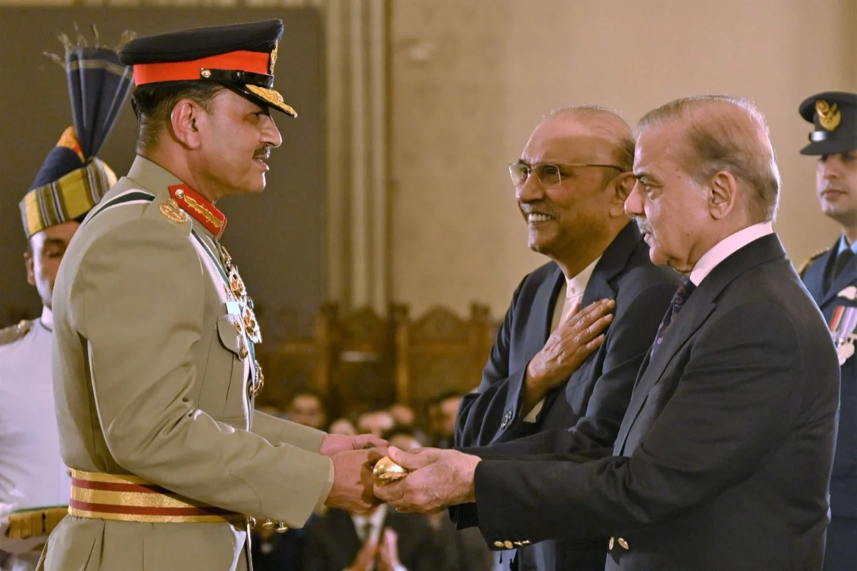 President, PM award COAS Asim Munir with Field Marshal Baton